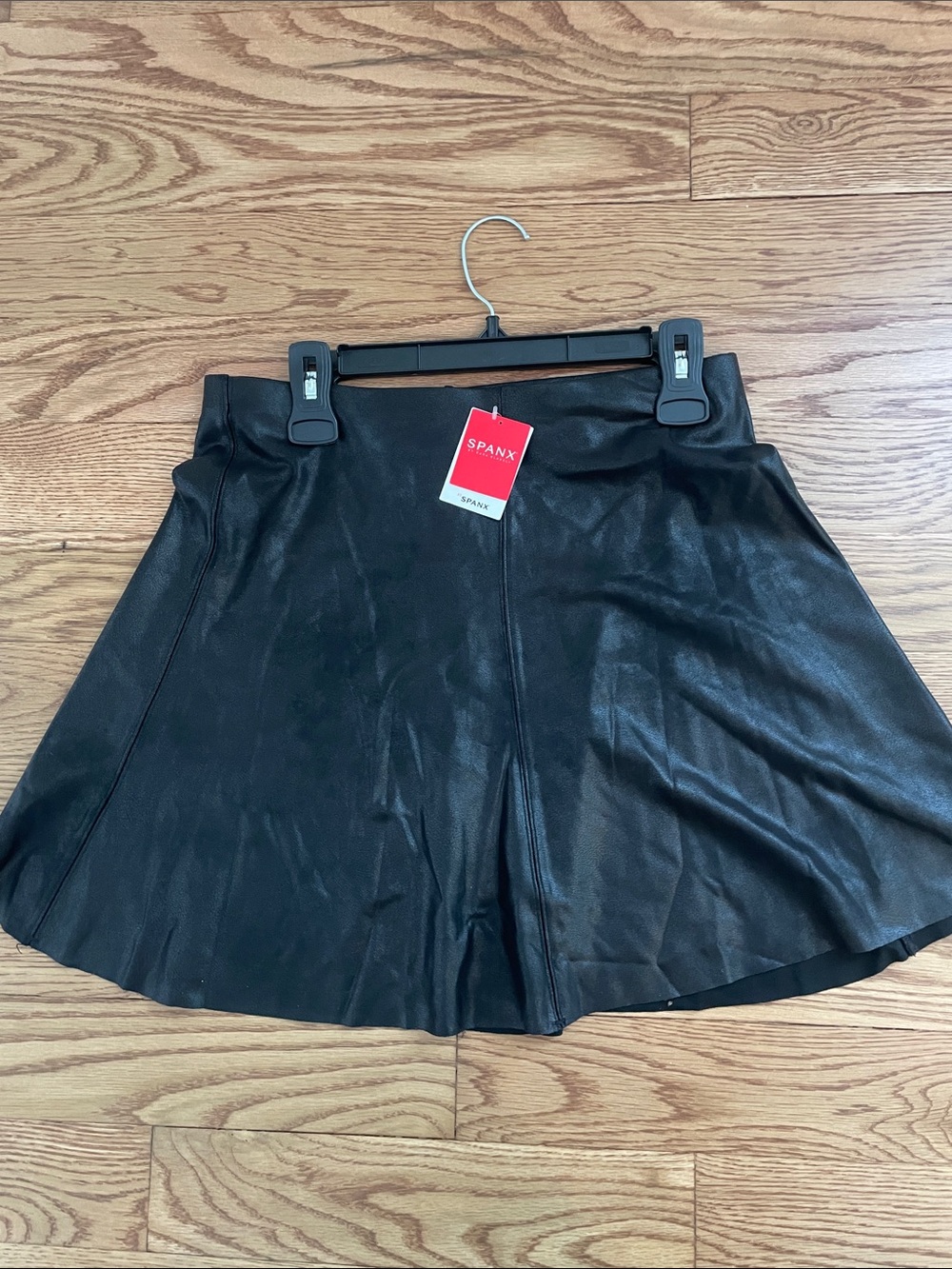 SPANX Black Faux Leather Mini Skirt with Flared Hem
